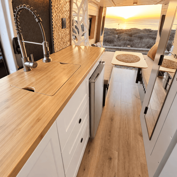 White Kitchen Cabinet with Fold-Out Bamboo Counter for Campervan | Vankea
