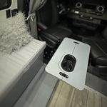 Front-mounted swivel table with secure cup holder for van use
