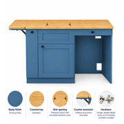 Campervan galley cabinet with folding side table for additional bamboo countertop space.