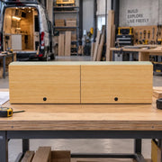 Vankea two-compartment Sprinter overhead wall cabinet with bamboo fronts and pre-wired 12V LED lighting.