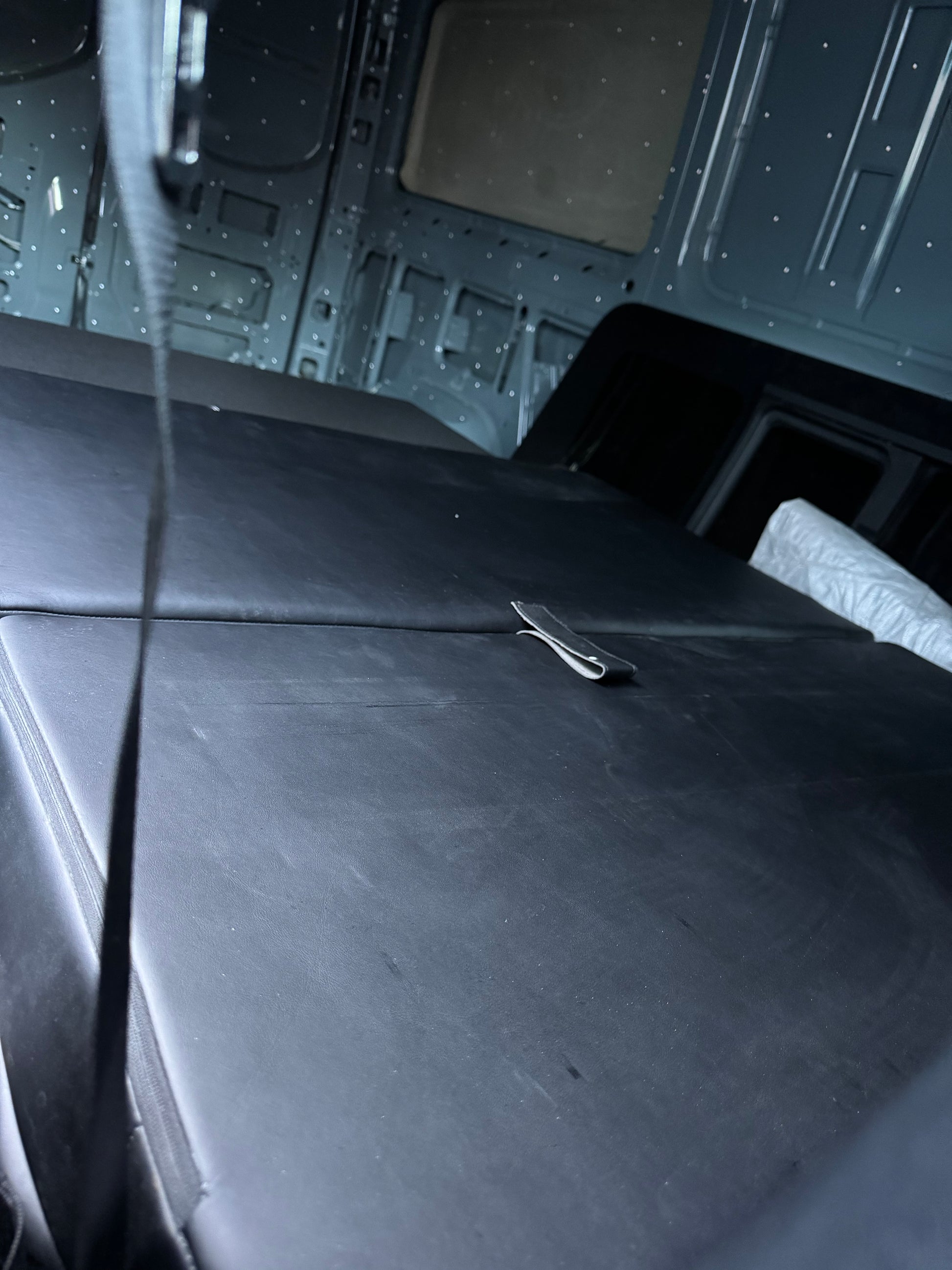 The seat folds flat to bed. Needs 72" by 47" space.